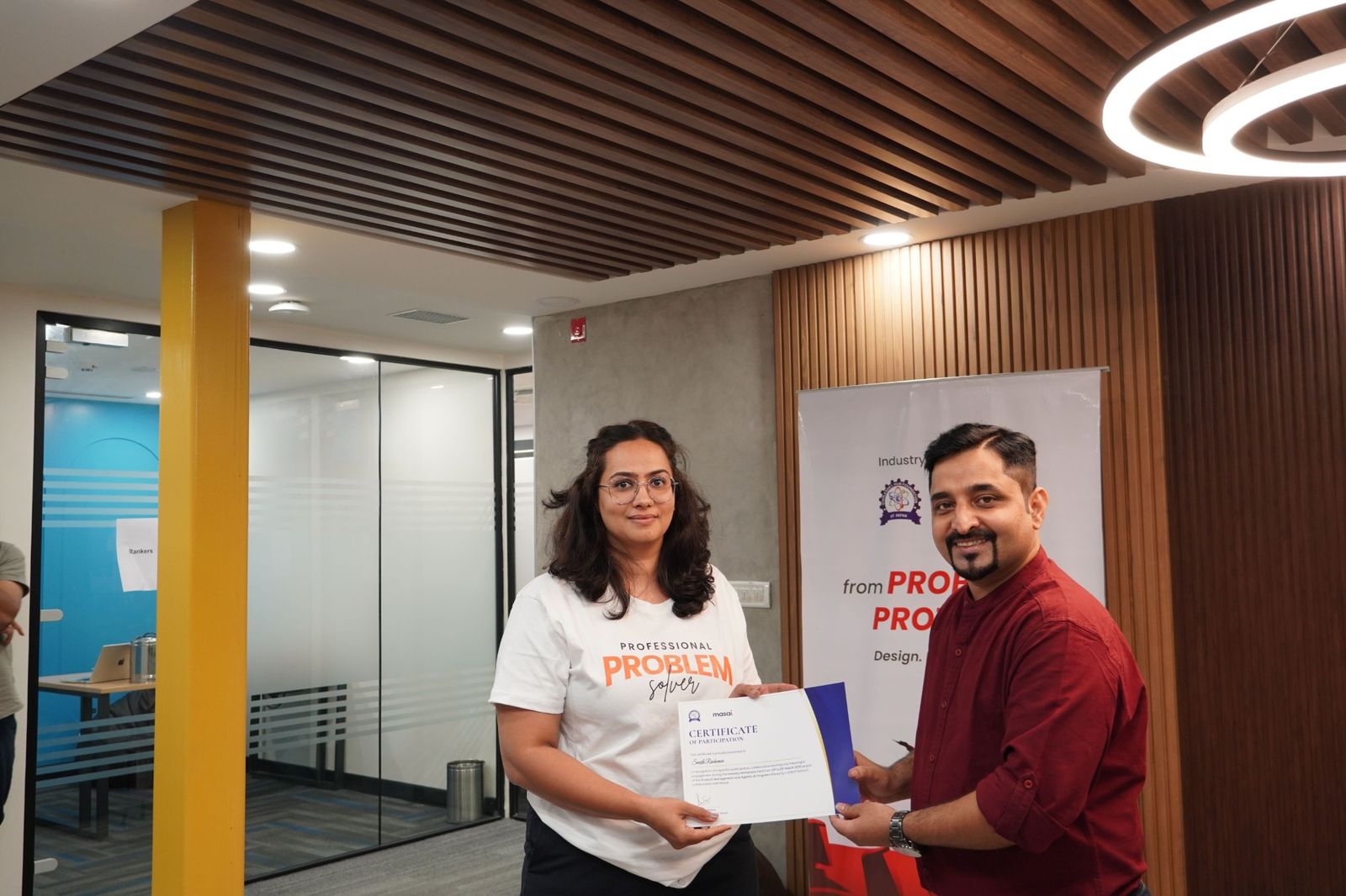 A learner receiving a certificate of participation